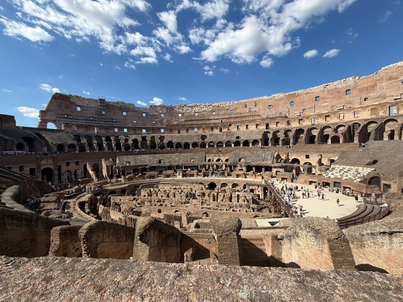 Inside the Colosseum, looking across the arena floor and the exposed hypogeum