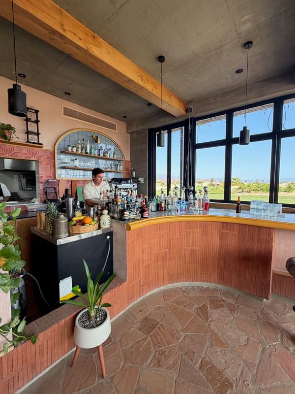 The bar at the course, terracotta and timber.