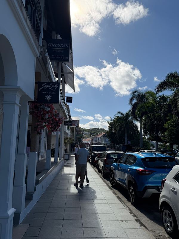 The shopping street in Gustavia, St. Barths, boutiques under the palms