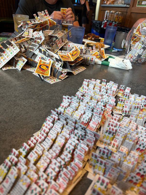 A table of pull-tab tickets at O&rsquo;Lydia&rsquo;s