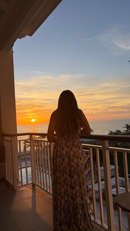 Jeannie on the balcony at sunset