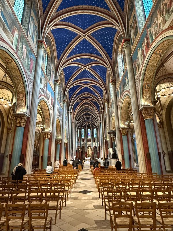 The painted nave of Saint-Germain-des-Prés, a starred blue vault over the arches