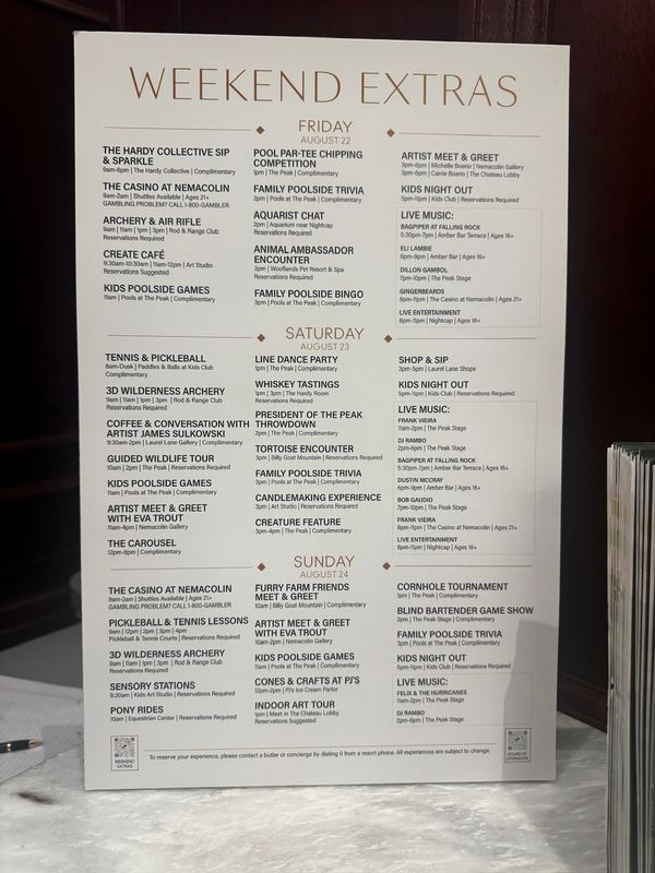 A printed Weekend Extras card listing the resort's activities for Friday, Saturday and Sunday